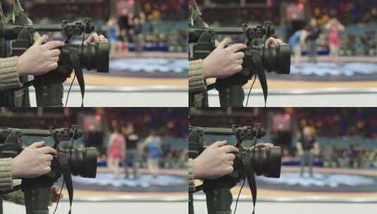 摔跤比赛中带照相机的摄影师。高清在线视频素材下载