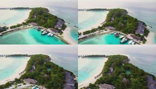 航拍海边度假屋沙滩海岛酒店绿树林马尔代夫高清在线视频素材下载