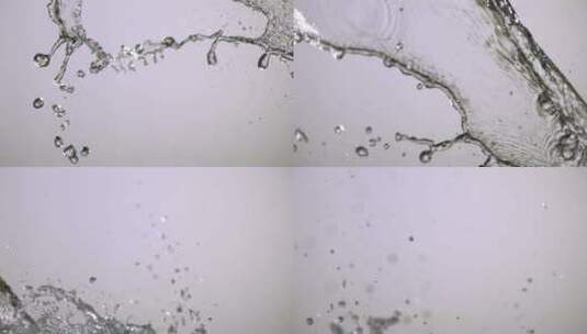 在反射表面上以超慢动作1500fps喷水-喷水高清在线视频素材下载