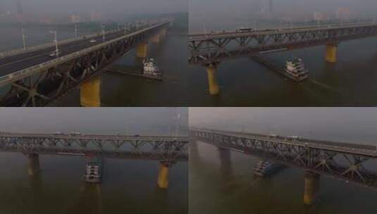 围绕航拍轮船穿过武汉长江大桥高清在线视频素材下载