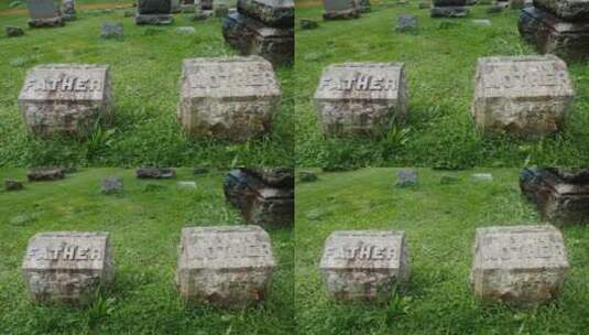 在草地上的墓碑特写镜头高清在线视频素材下载