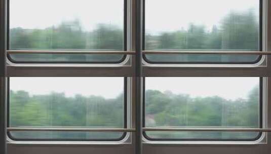 火车车窗外的沿途风景高清在线视频素材下载
