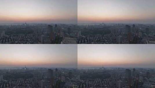 日落时分的江苏南京鼓楼区城市天际线航拍高清在线视频素材下载