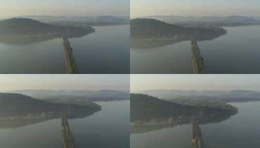 航拍武汉东湖磨山傍晚湖中道俯拍高清在线视频素材下载