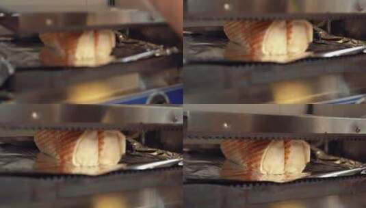 在烤架上按压墨西哥卷饼的人高清在线视频素材下载