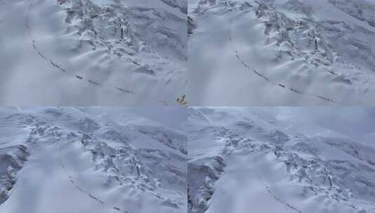 航拍冰川之父慕士塔格峰雪山冰川上的登山队高清在线视频素材下载