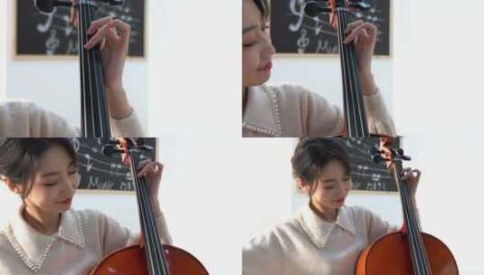 拉大提琴的青年女人高清在线视频素材下载