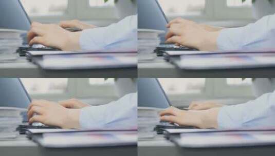 女人的手在笔记本电脑上打字高清在线视频素材下载