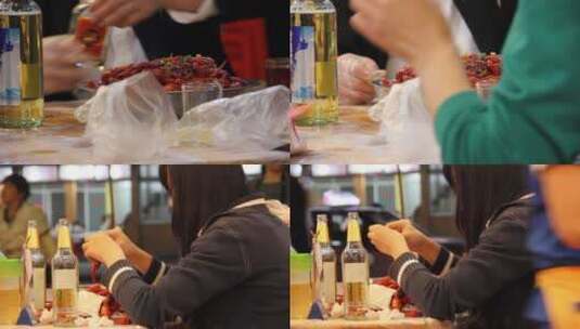 餐桌上的小龙虾吃虾的人聚餐高清在线视频素材下载
