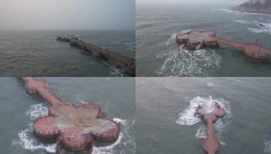 航拍威海金海湾栈桥的冬天风浪合集高清在线视频素材下载