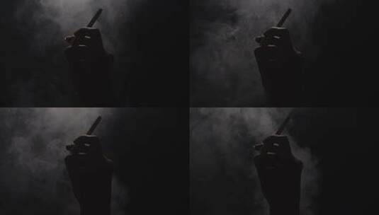 一只手叼着香烟烟雾慢镜头6高清在线视频素材下载