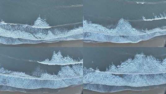 俯拍沙滩潮汐海水浪花拍打海岸海边涨潮退潮高清在线视频素材下载