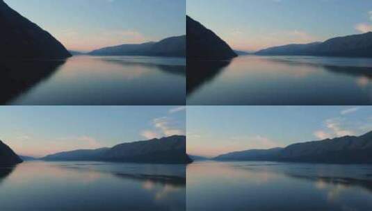 日落时山脉之间的湖高清在线视频素材下载