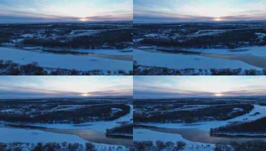 航拍初春海拉尔河湿地清晨雪景风光高清在线视频素材下载