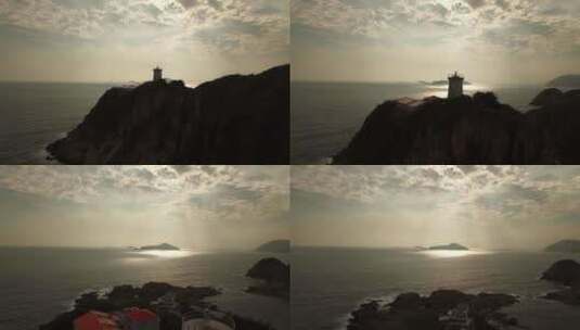 夕阳下海边的灯塔高清在线视频素材下载