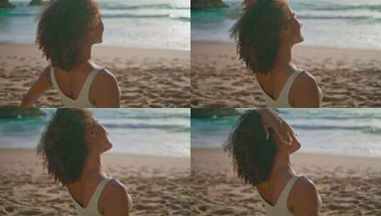 非洲女孩伸展脖子上沙滩特写高清在线视频素材下载