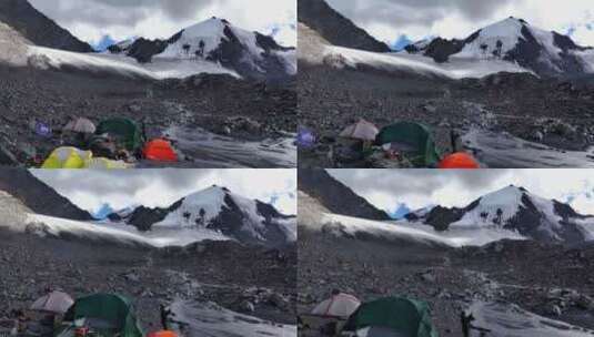 航拍攀登横断山脉乌库楚雪山的登山者C1营地高清在线视频素材下载