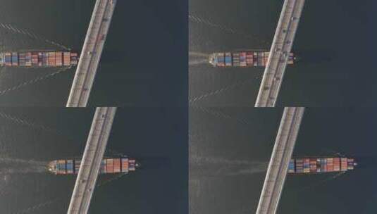 航拍集装箱船从大桥下通过高清在线视频素材下载