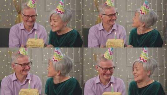 许愿家庭戴派对帽的老年夫妇在家一起庆祝生高清在线视频素材下载