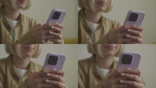 使用紫色智能手机的女性特写高清在线视频素材下载