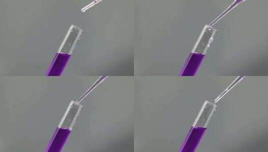 向试管里滴粉紫色溶液高清在线视频素材下载