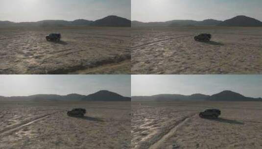 行驶在沙漠中的汽车高清在线视频素材下载