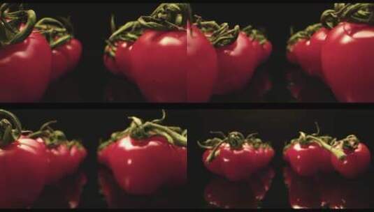 在黑色背景下新鲜的番茄高清在线视频素材下载