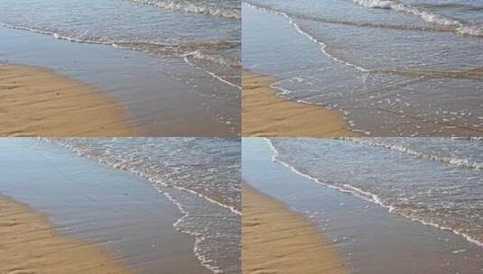 夏天的海边海滩上波浪泛起朵朵浪花高清在线视频素材下载