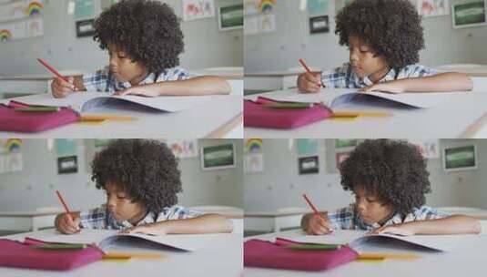 专注的非裔美国男孩在教室上课的视频高清在线视频素材下载
