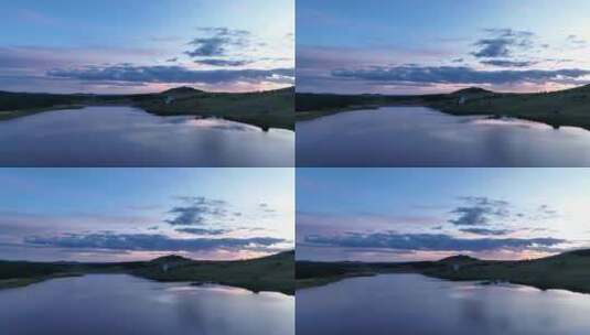 航拍呼伦贝尔绿色山谷湖泊高清在线视频素材下载