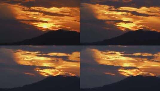 傍晚天空云朵夕阳山峰日落延时风景唯美黄昏高清在线视频素材下载
