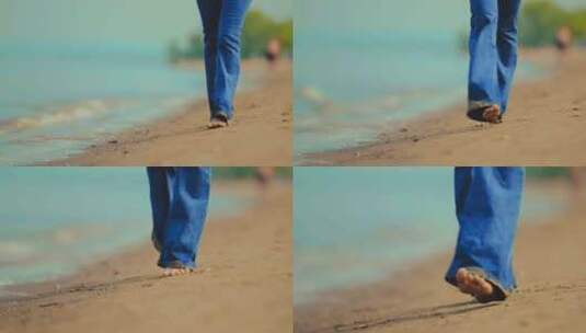 穿着湿牛仔裤和赤脚的女人在海滩上的沙滩上散步高清在线视频素材下载