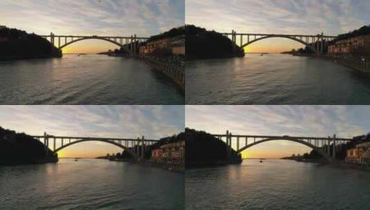 夕阳下的河面和跨河大桥高清在线视频素材下载