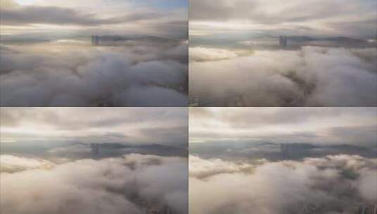 航拍延时5.4K深圳龙华星河双子塔日出平流雾高清在线视频素材下载