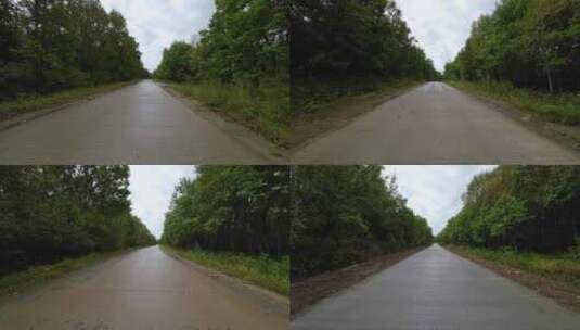 阴天开车经过森林公路高清在线视频素材下载