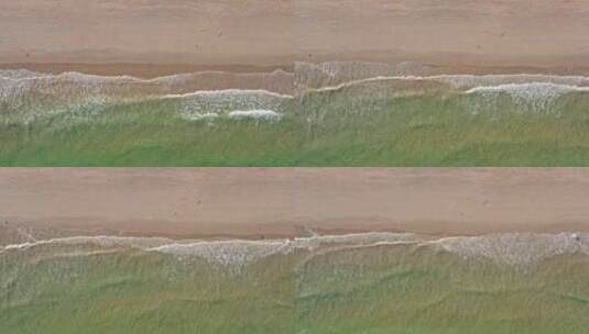 深圳海边沙滩海浪俯视右横移高清在线视频素材下载