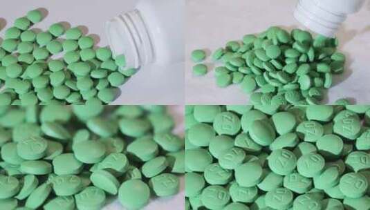 合集绿色药丸药片从白色药瓶倒出旋转高清在线视频素材下载