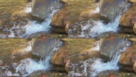 从石头上流下的溪水高清在线视频素材下载