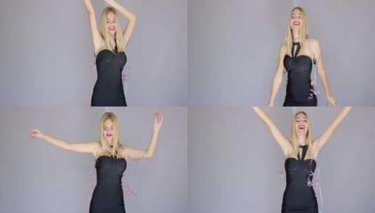 快乐性感的年轻女子穿礼服跳舞高清在线视频素材下载