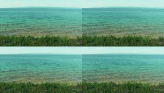 夏天的海岸线上有一片碧蓝的大海高清在线视频素材下载