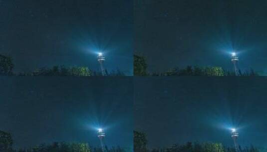 夜晚海港闪烁的灯塔海南木兰湾灯塔星空高清在线视频素材下载