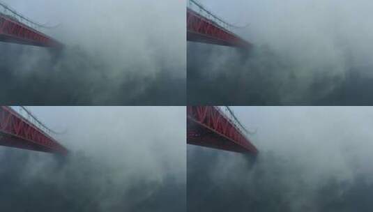 航拍雨雾中的矮寨大桥和德夯大峡谷风光高清在线视频素材下载