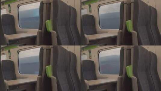 透过行驶的火车车窗看窗外风景高清在线视频素材下载