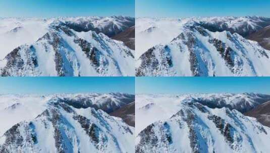 冬季航拍蓝天下的夹金山雪山风景高清在线视频素材下载