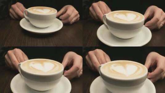 特写侍者端上一杯卡布奇诺咖啡高清在线视频素材下载