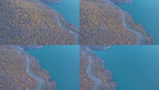 色彩斑斓的山公路与大海相邻高清在线视频素材下载