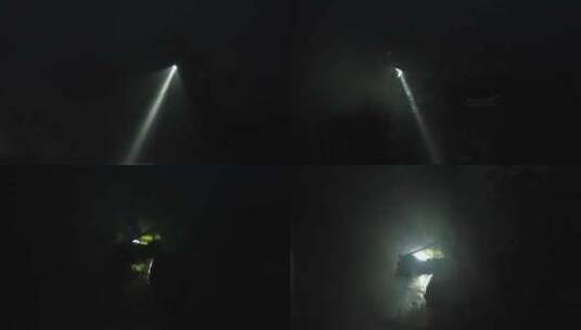 消防员在黑暗中使用手电筒高清在线视频素材下载