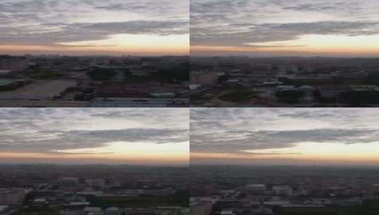 竖版航拍城市夕阳晚霞日落火烧云高清在线视频素材下载