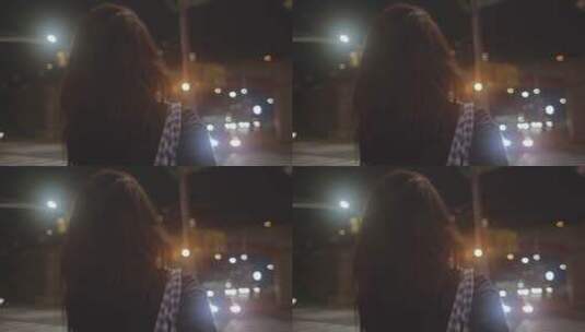 夜晚走在街道上的女人高清在线视频素材下载