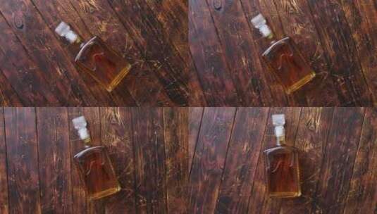 木桌上放一瓶威士忌高清在线视频素材下载